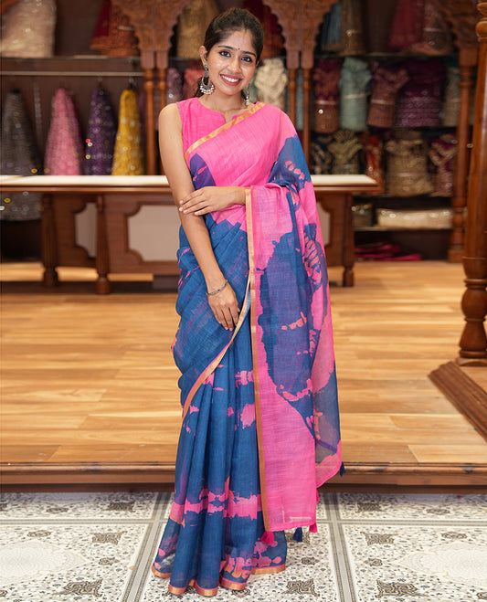 Blue shibori printed linen cotton saree, contrast piping zari border, shibori circle printed pallu, and a contrast shibori printed blouse