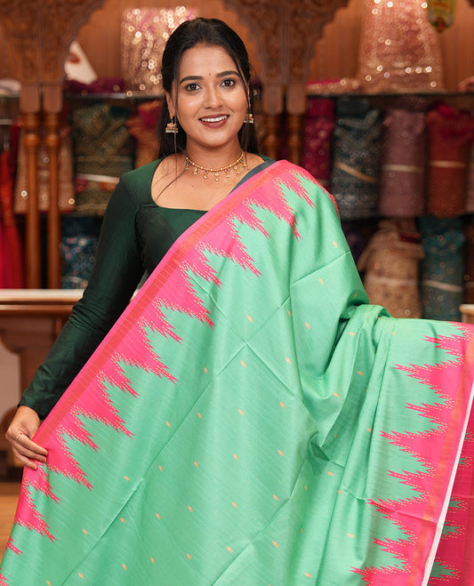 Emerald Green Katan Silk Saree Features Buttas, Complemented by Contrast Temple Zari Border, Striped Pallu, and a Contrast Blouse
