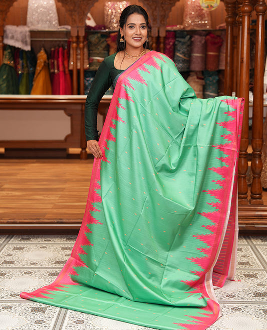 Emerald Green Katan Silk Saree Features Buttas, Complemented by Contrast Temple Zari Border, Striped Pallu, and a Contrast Blouse