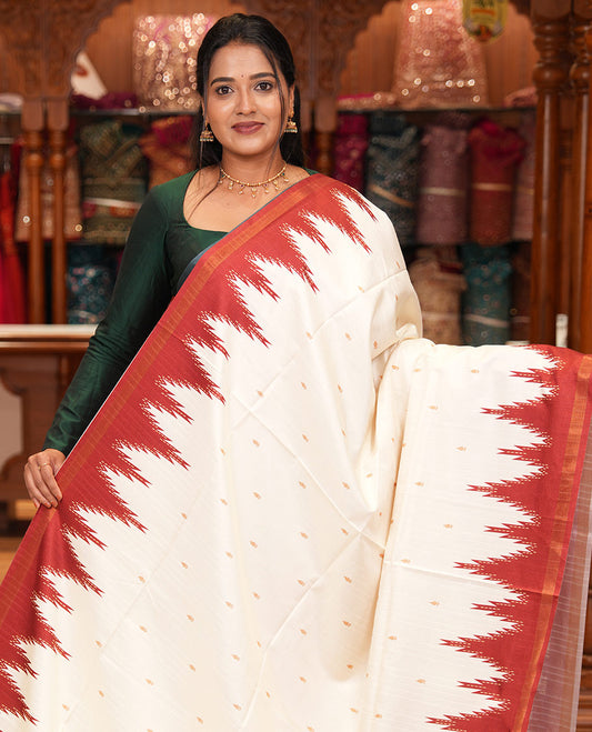 Cream-Red Katan Silk Saree Features Buttas, Complemented by Contrast Temple Zari Border, Striped Pallu, and a Contrast Blouse