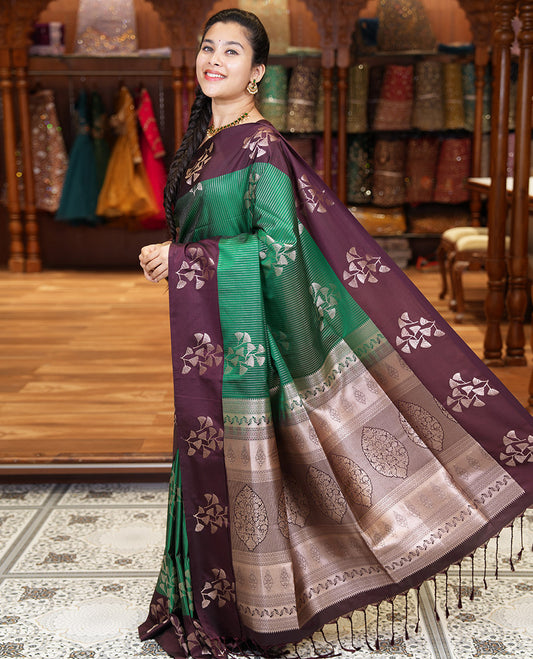 Dark Green Semi-Soft Silk Saree, Highlighted by Vaira Oosai Stripes and Floral Buttas All Over Its Body, Complemented by a Contrast Floral Buttas Border, an Intricately Designed Pallu, and Paired with a  Contrast Blouse