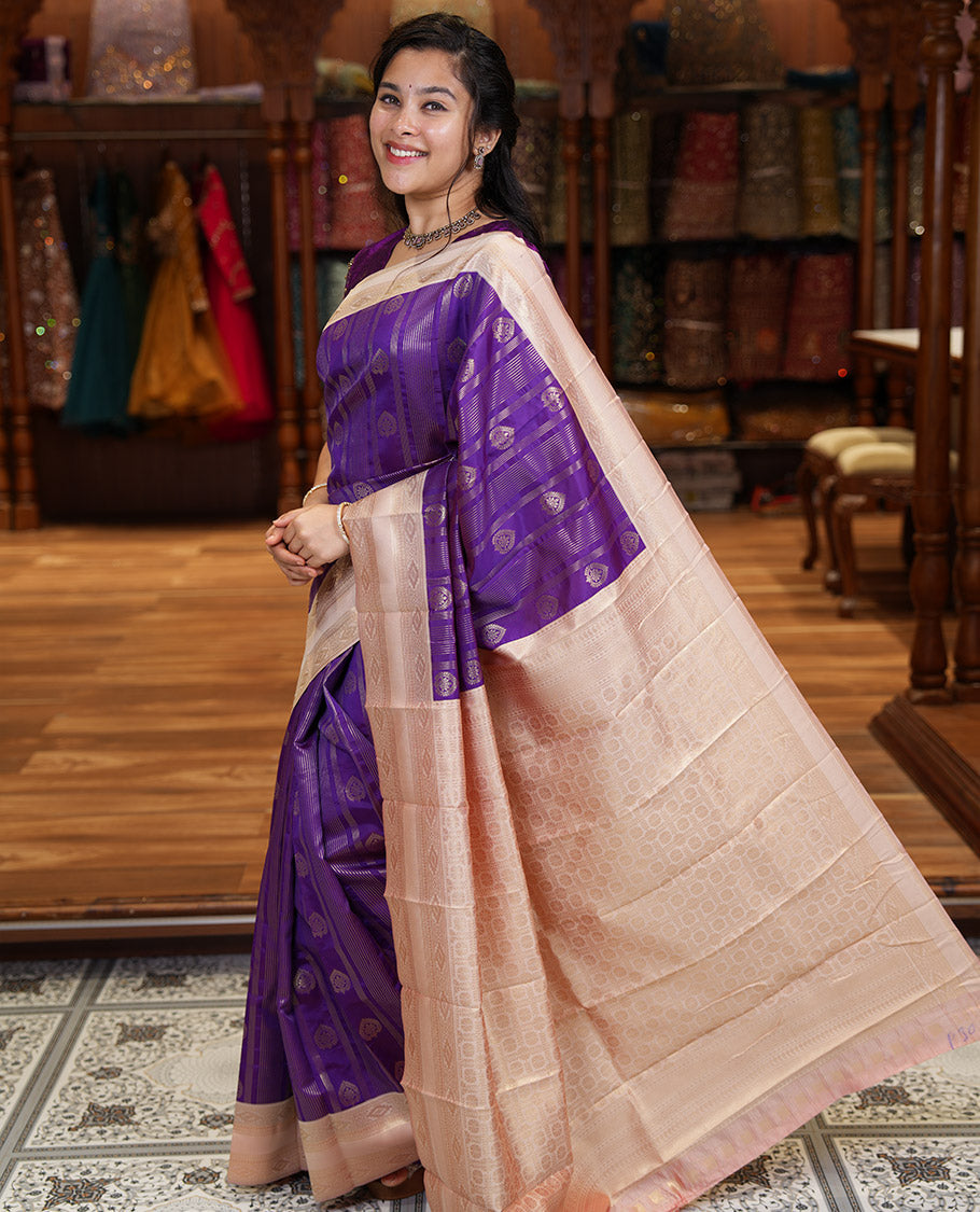 Magenta Pink Litchi Saree, Adorned with Vaira Oosi Stripes and Zari Buttas on Its Body, Complemented by a Contrast Rettai Pettu Traditional Zari Design Border, an Intricately Designed Pallu, and Paired with a Contrast Blouse