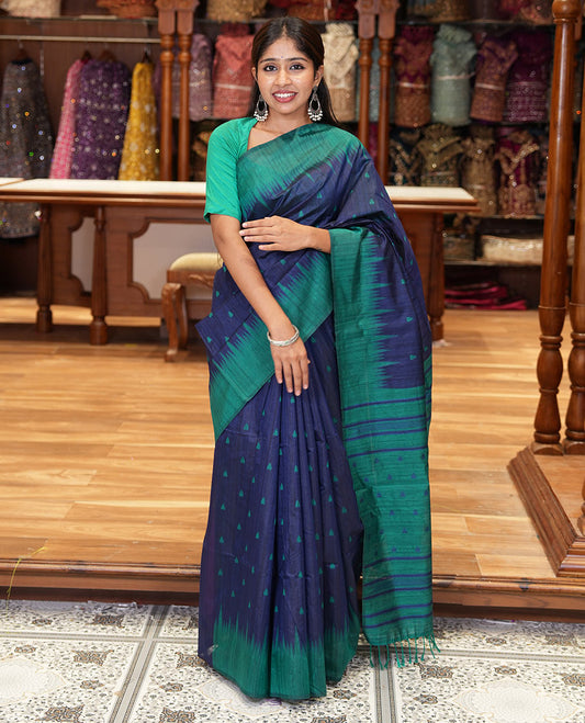 Navy blue buttas semi-jute saree with contrast temple border, thread striped pallu, and a contrast thread buttas blouse