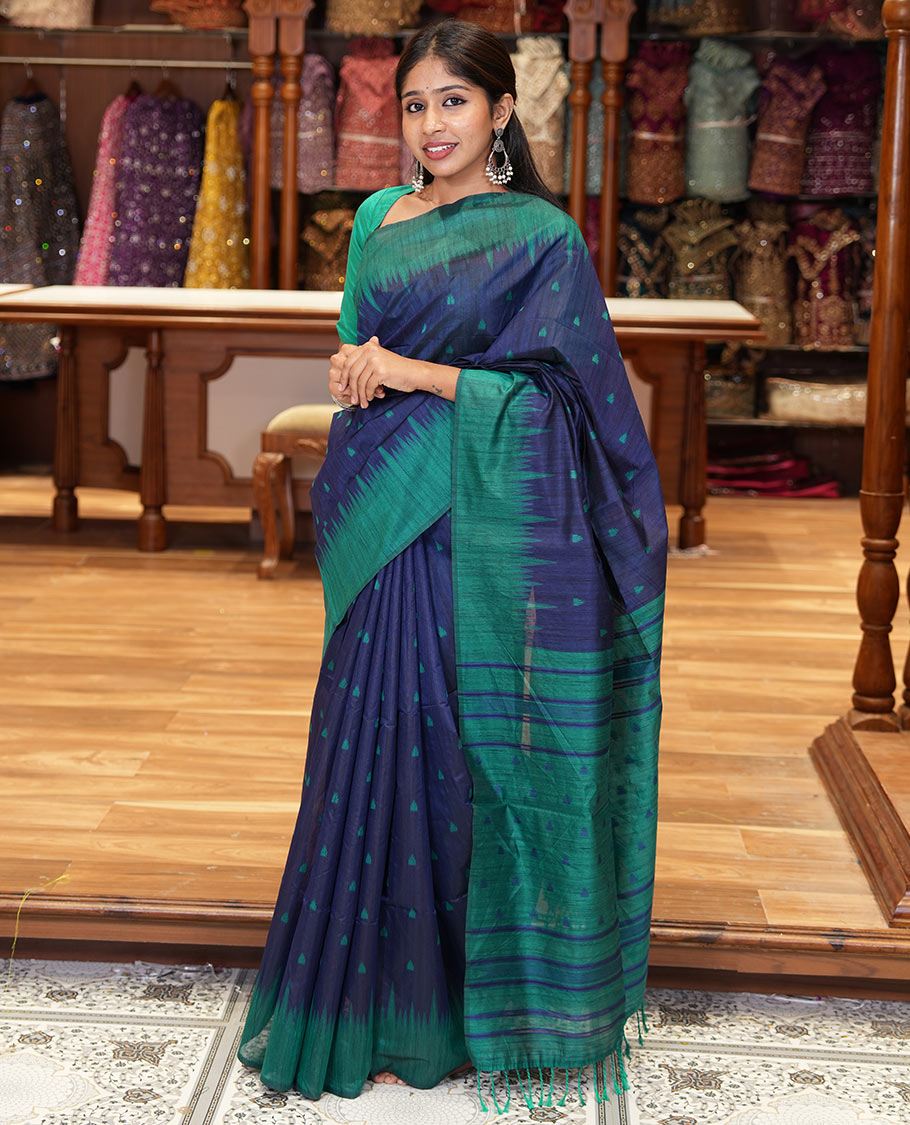 Navy blue buttas semi-jute saree with contrast temple border, thread striped pallu, and a contrast thread buttas blouse