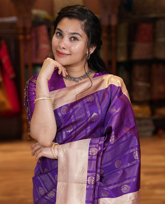 Magenta Pink Litchi Saree, Adorned with Vaira Oosi Stripes and Zari Buttas on Its Body, Complemented by a Contrast Rettai Pettu Traditional Zari Design Border, an Intricately Designed Pallu, and Paired with a Contrast Blouse