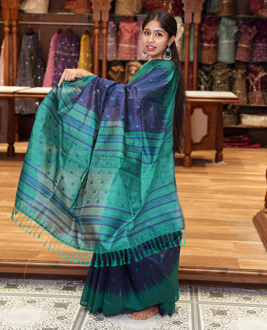 Navy blue buttas semi-jute saree with contrast temple border, thread striped pallu, and a contrast thread buttas blouse