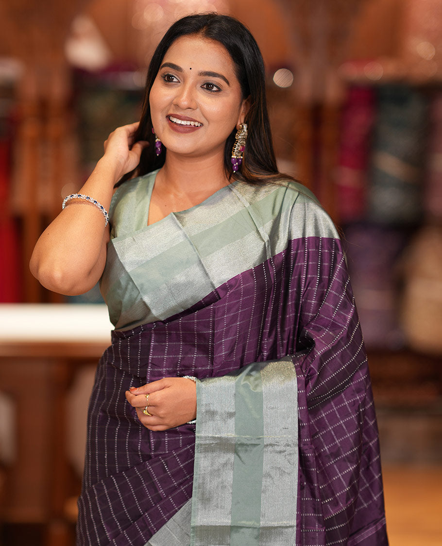 Purple Checked Semi-Soft Silk Saree, Complemented by a Contrast Striped Border, Checked Self-Pallu, and a Matching Blouse