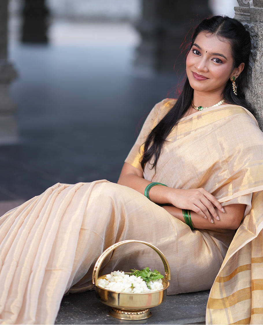 Gold Plain Tissue Mul Cotton Saree, Subtly Sparkled with Zari Border, Gleaming Zari Woven Pallu, and Paired with a Matching Blouse