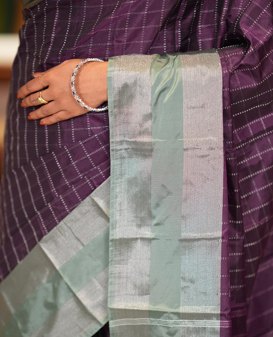 Purple Checked Semi-Soft Silk Saree, Complemented by a Contrast Striped Border, Checked Self-Pallu, and a Matching Blouse