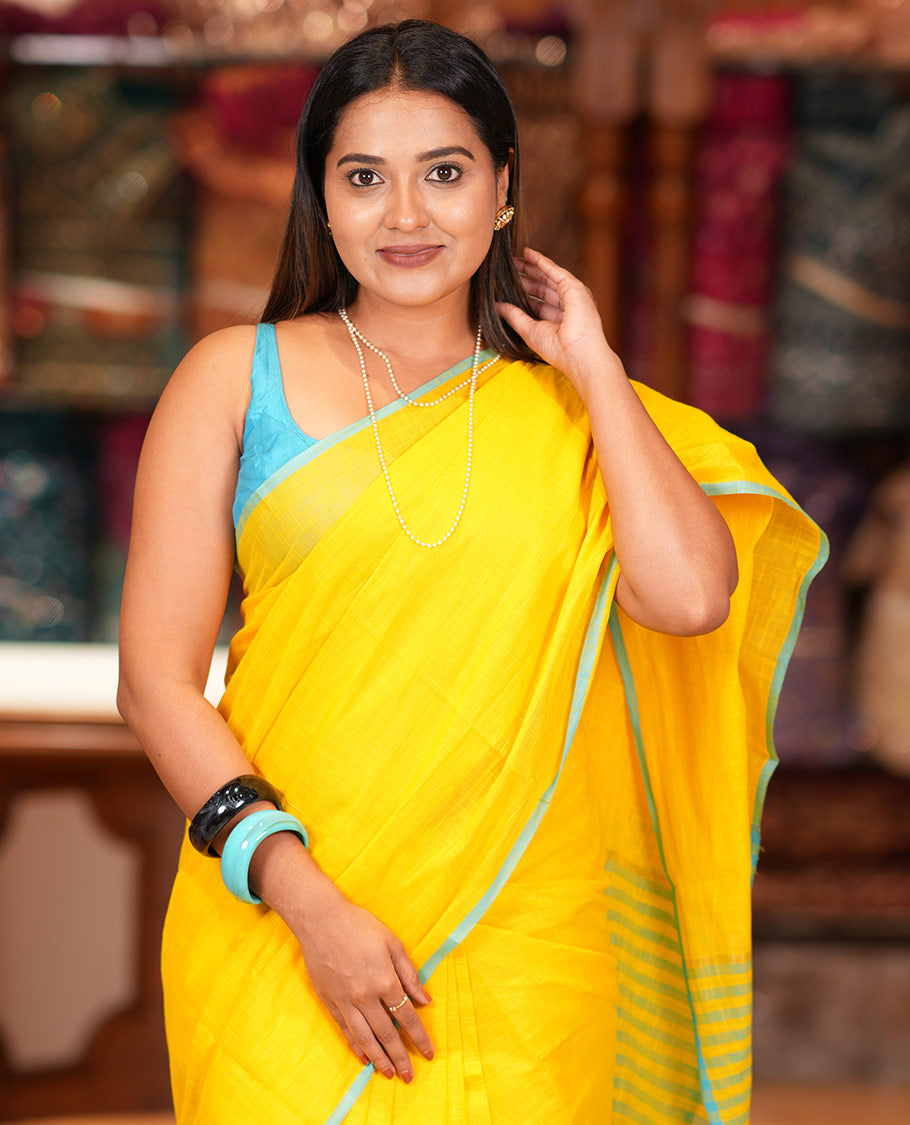 Yellow Geometric Textured Handloom Mercerized Cotton Saree, a Subtle Piping Border, Striped Pallu, and a Contrast Blouse