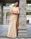 Gold Plain Tissue Mul Cotton Saree, Subtly Sparkled with Zari Border, Gleaming Zari Woven Pallu, and Paired with a Matching Blouse