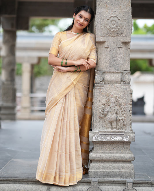 Gold Plain Tissue Mul Cotton Saree, Subtly Sparkled with Zari Border, Gleaming Zari Woven Pallu, and Paired with a Matching Blouse