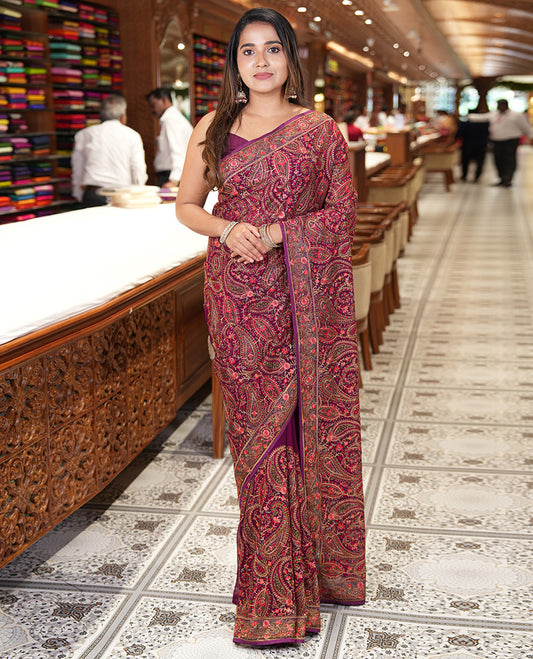 Wine Georgette Saree, Accentuated with Intricate Paisleys, Kashmir Embroidered and Stone Work on Its Body, a Self-Embroidered Border, and Paired with an Embroidered Blouse