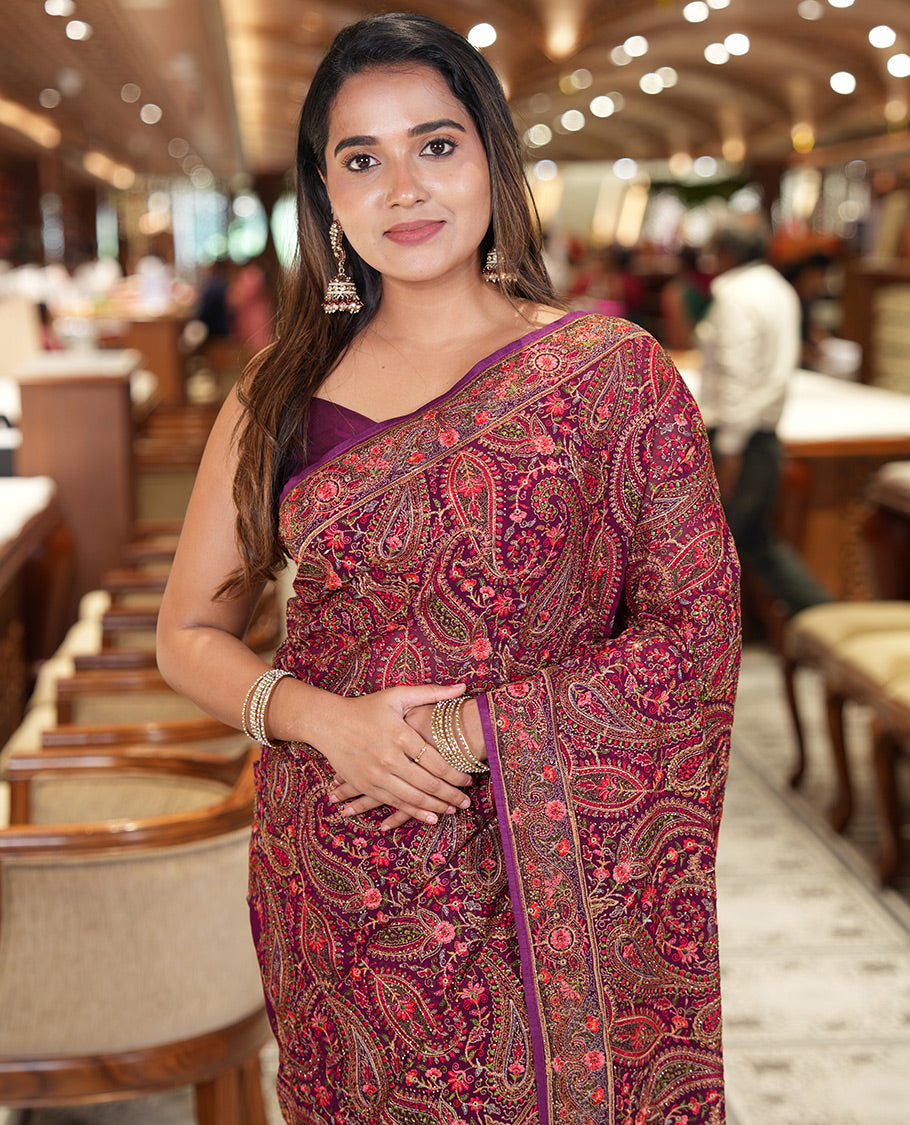 Wine Georgette Saree, Accentuated with Intricate Paisleys, Kashmir Embroidered and Stone Work on Its Body, a Self-Embroidered Border, and Paired with an Embroidered Blouse