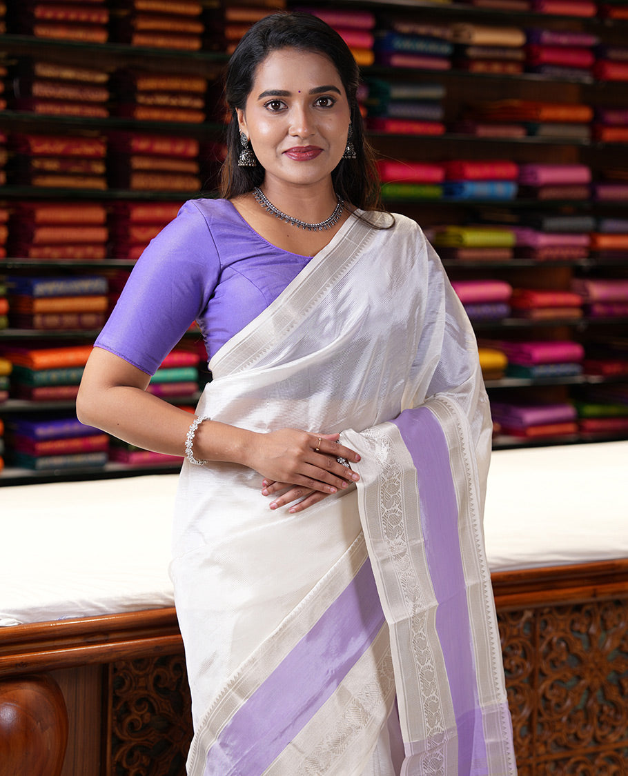 Off-White and Lavender Mangalagiri Silk Saree, Sparsely Woven Stripes on Its Body, Complemented by Contrast Border of Temple and Peacock Designs, Striped Pallu, and Paired with a Contrast Blouse