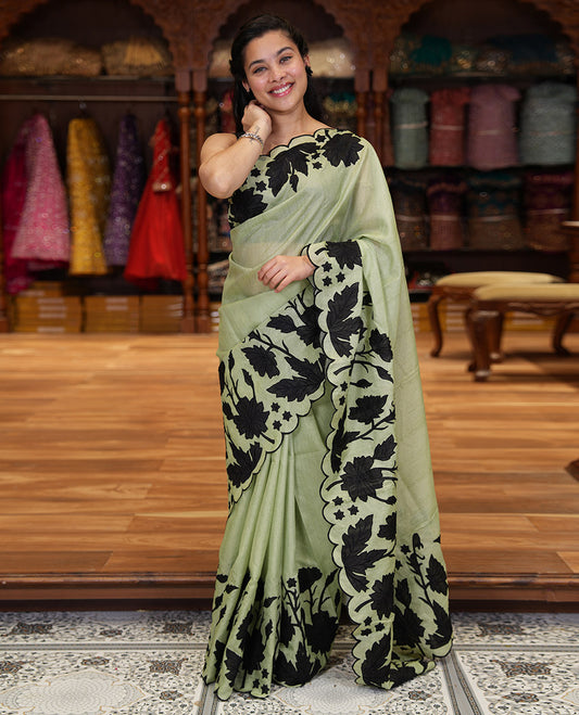 Pista Green Plain Fancy Kota Silk Saree Highlighted with Floral Applique Embroidered Scallop Border, Applique Embroidered Pallu, and a Matching Blouse