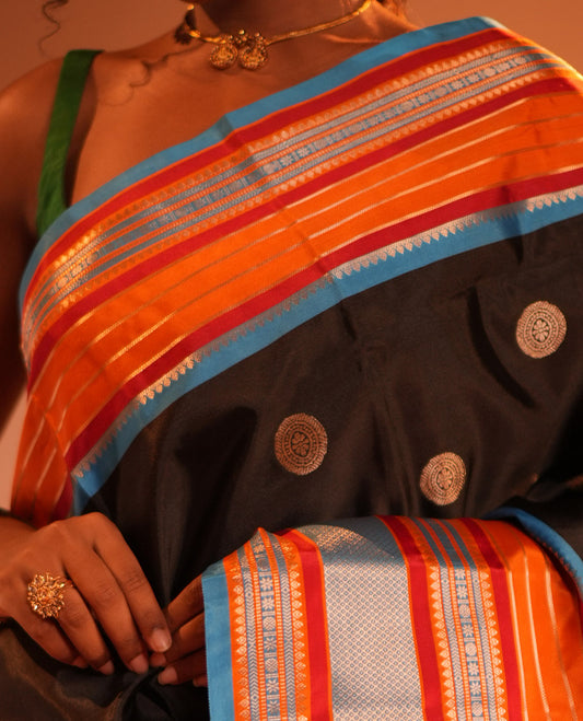 Black Chakram Buttas Semi-Soft Silk Saree