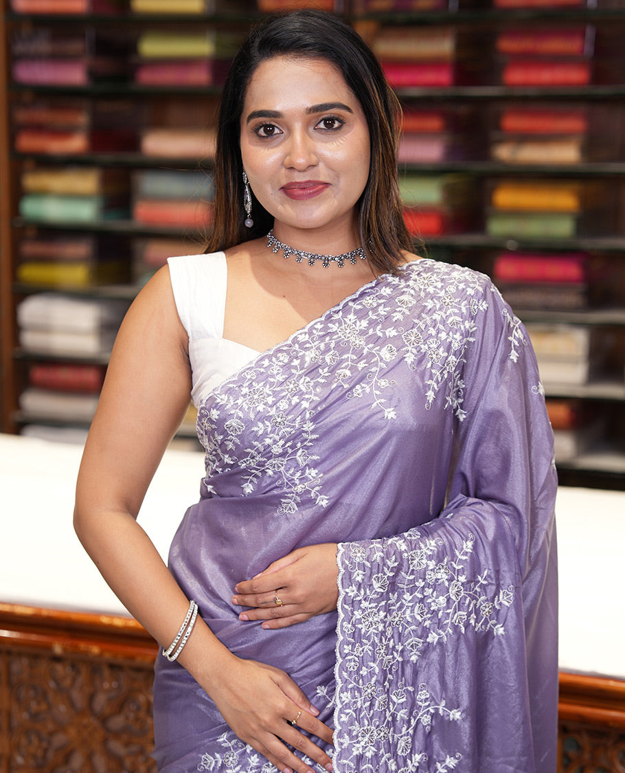 Lavender Plain Satin Crepe Saree, Accentuated with Floral Vine Thread Embroidery on Its Border, a Self-Pallu, and Paired with a Matching Blouse