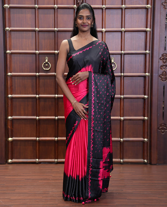 Black and Red Satin Crepe Saree Elevated with Shibori Prints, Complemented by Contrast Shibori Printed Border, Pallu Decked Up with Shibori Prints, and Paired with a Plain Blouse