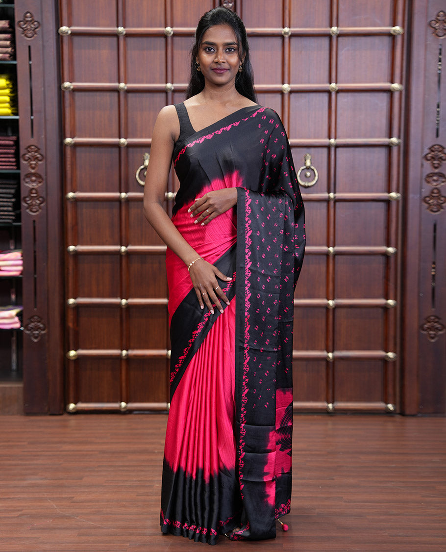 Black and Red Satin Crepe Saree Elevated with Shibori Prints, Complemented by Contrast Shibori Printed Border, Pallu Decked Up with Shibori Prints, and Paired with a Plain Blouse