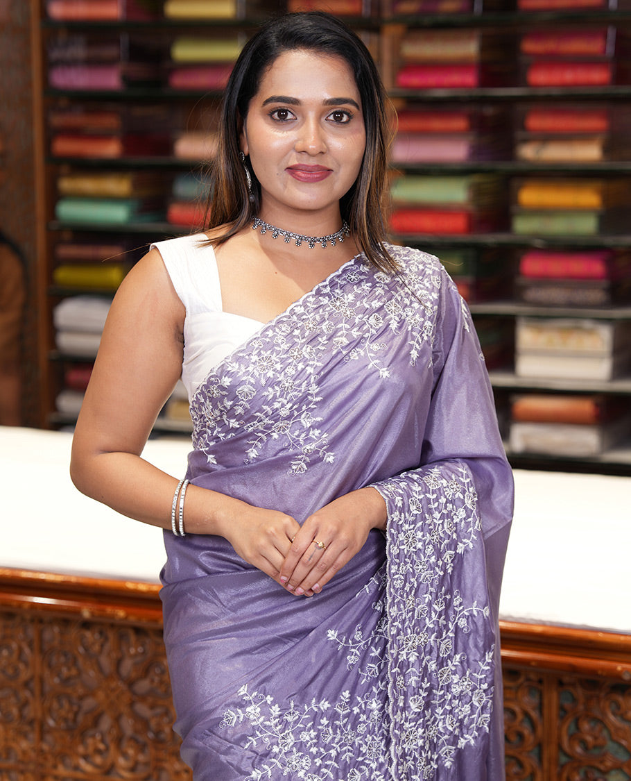 Lavender Plain Satin Crepe Saree, Accentuated with Floral Vine Thread Embroidery on Its Border, a Self-Pallu, and Paired with a Matching Blouse