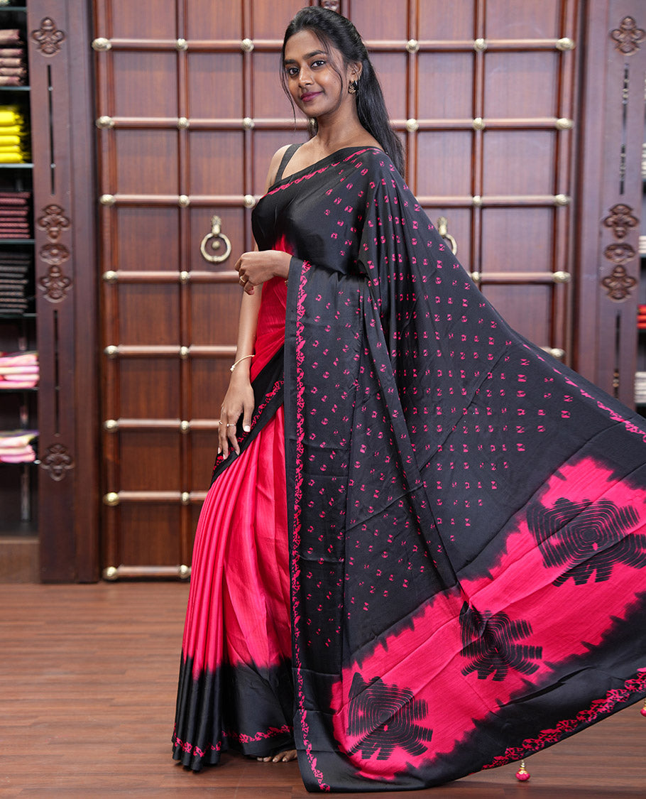 Black and Red Satin Crepe Saree Elevated with Shibori Prints, Complemented by Contrast Shibori Printed Border, Pallu Decked Up with Shibori Prints, and Paired with a Plain Blouse