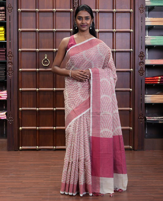 Chikku and Pink Kota Cotton Saree Subtly Woven with Zig-Zag Checks in Thread, Subtly Sparkled Contrast Bavanji Border, Plain Pallu, and Paired with a Matching Blouse