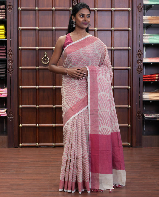 Chikku and Pink Kota Cotton Saree Subtly Woven with Zig-Zag Checks in Thread, Subtly Sparkled Contrast Bavanji Border, Plain Pallu, and Paired with a Matching Blouse