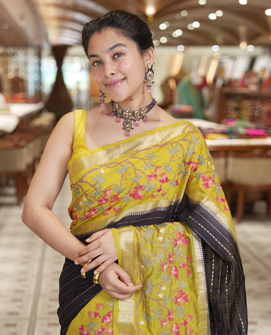 Black Assam Silk Saree Featuring Horizontal Zari Stripes, Contrast Floral Embroidered Border, Zari Striped Pallu, and a Contrast Blouse