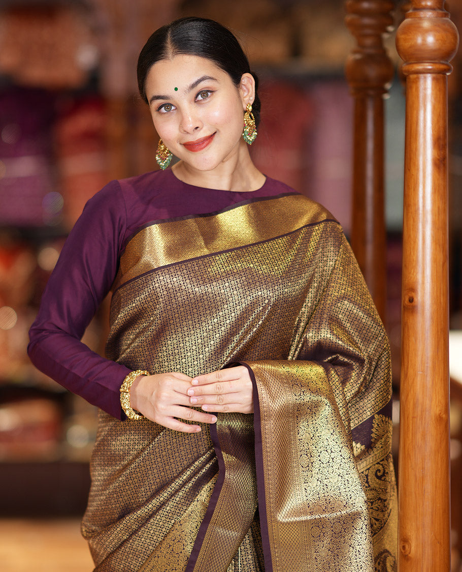 Coffee Brown Kanchipuram Budget Silk Saree Richly Detailed with Jacquard Design, Highlighted by Zari Border of Floral and Jaal Designs, Pallu Embellished with Big Paisley Designs, and Paired with a Matching Blouse