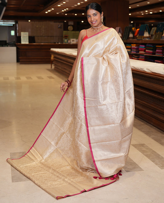 Off-White-Maroon Semi-Silk Saree, Adorned with Floral Jacquard Design, a Zari Paisley Border, and a Contrast Blouse