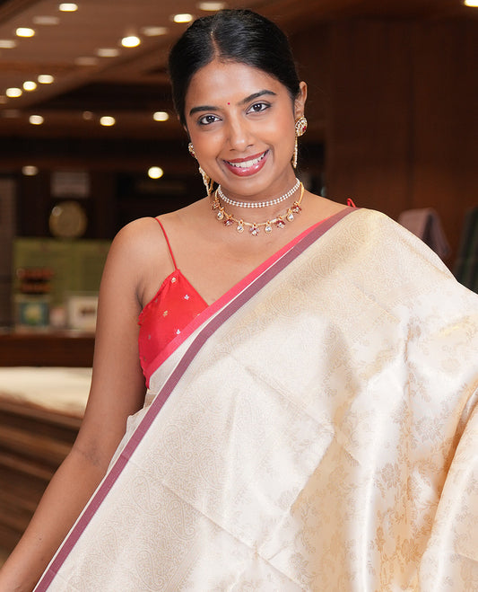 Off-White-Brown Semi-Silk Saree, Adorned with Floral Jacquard Design, a Zari Paisley Border, and a Contrast Blouse