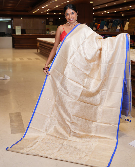 Off-White-M.s Blue Semi-Silk Saree, Adorned with Floral Jacquard Design, a Zari Paisley Border, and a Contrast Blouse