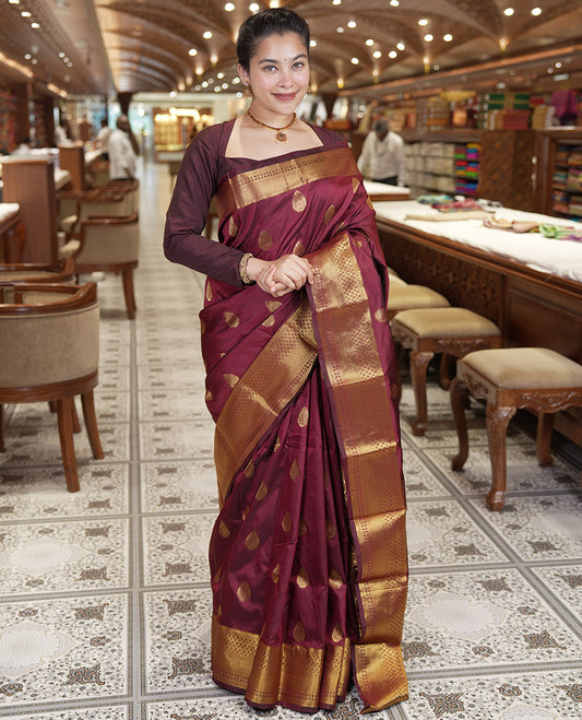 Maroon Art Silk Saree, Enriched with Zari Buttas, Traditional Border, Intricate Pallu, and a Matching Blouse