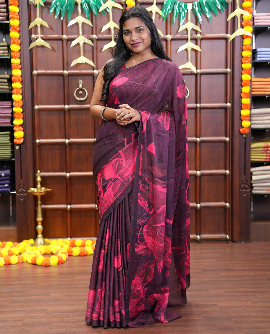 Borderless Maroon Shimmer Chiffon Saree, Artfully Printed with Abstract-Style Floral Print All Over Its Body,  Pallu Mirrors the Same Print, and Paired with a Matching Blouse