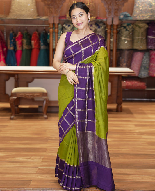 Mehendi Green Plain Assam Silk Saree, Complemented by Gharchola Checked Border, Gleaming Zari Striped Pallu, and Paired with a Contrast Blouse