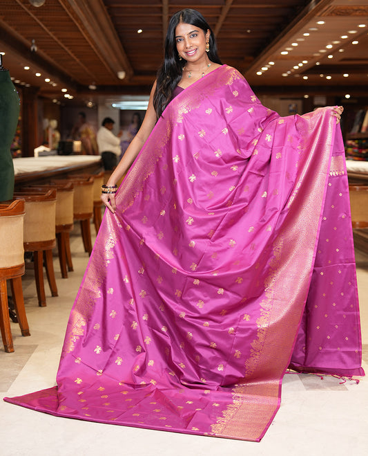 Magenta Soft Silk Saree, Decorated with Horse-Peacock Buttas, a Zari Border, Jaal Pallu, and a Matching Blouse
