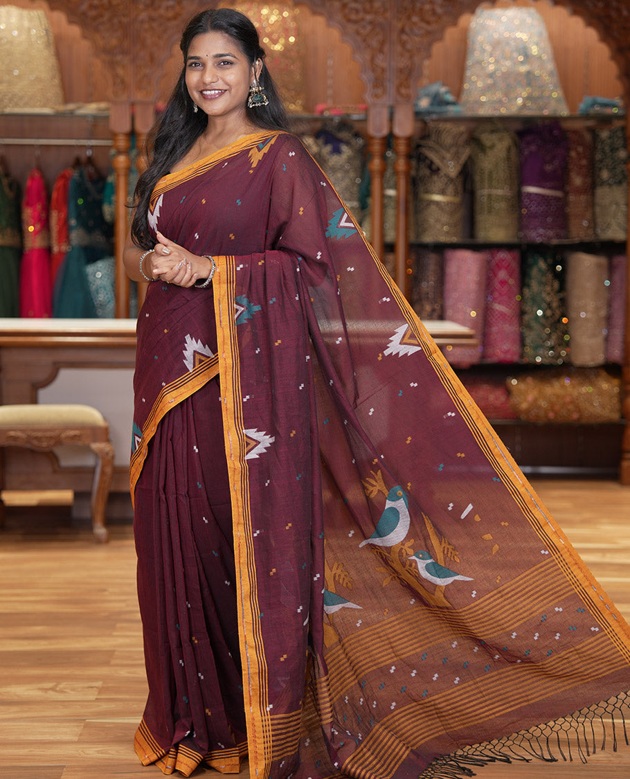 Maroon Khadi Mul Cotton Saree Features Buttas, Contrast Temple Border, Jhamdani Floral-Bird Woven Pallu, and a Matching Blouse