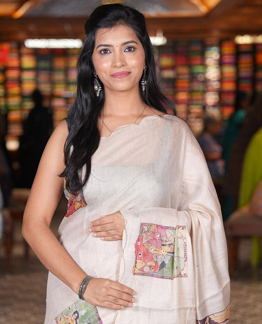 Gold Tissue Saree, Creatively Designed with Female Motifs Painting and Mirror work, a Scallop Border,  and a Printed Blouse