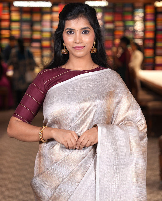 Cream Elite Soft Silk Saree, Gleamed up with Jacquard Design, Highlighted by Traditional Zari Border, Grand Pallu and a Matching Blouse