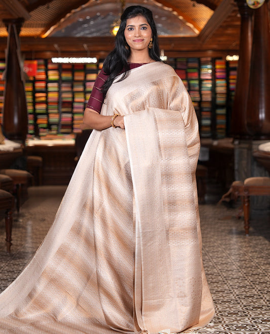 Cream Elite Soft Silk Saree, Enriched with Jacquard Design, Highlighted by Traditional Zari Border, Grand Pallu and a Matching Blouse