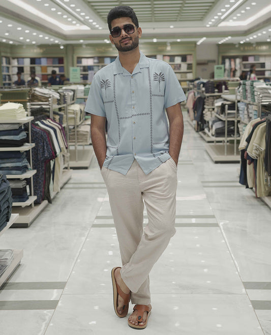 Light Blue Cotton-Blended Casual Shirt, Subtle Sparkled with Contemporary Prints, Comes with a Cuban Collar, Half-Sleeves, Regular Fit, and Regular Length