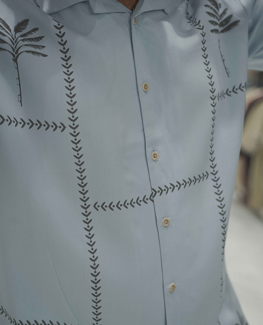 Light Blue Cotton-Blended Casual Shirt, Subtle Sparkled with Contemporary Prints, Comes with a Cuban Collar, Half-Sleeves, Regular Fit, and Regular Length