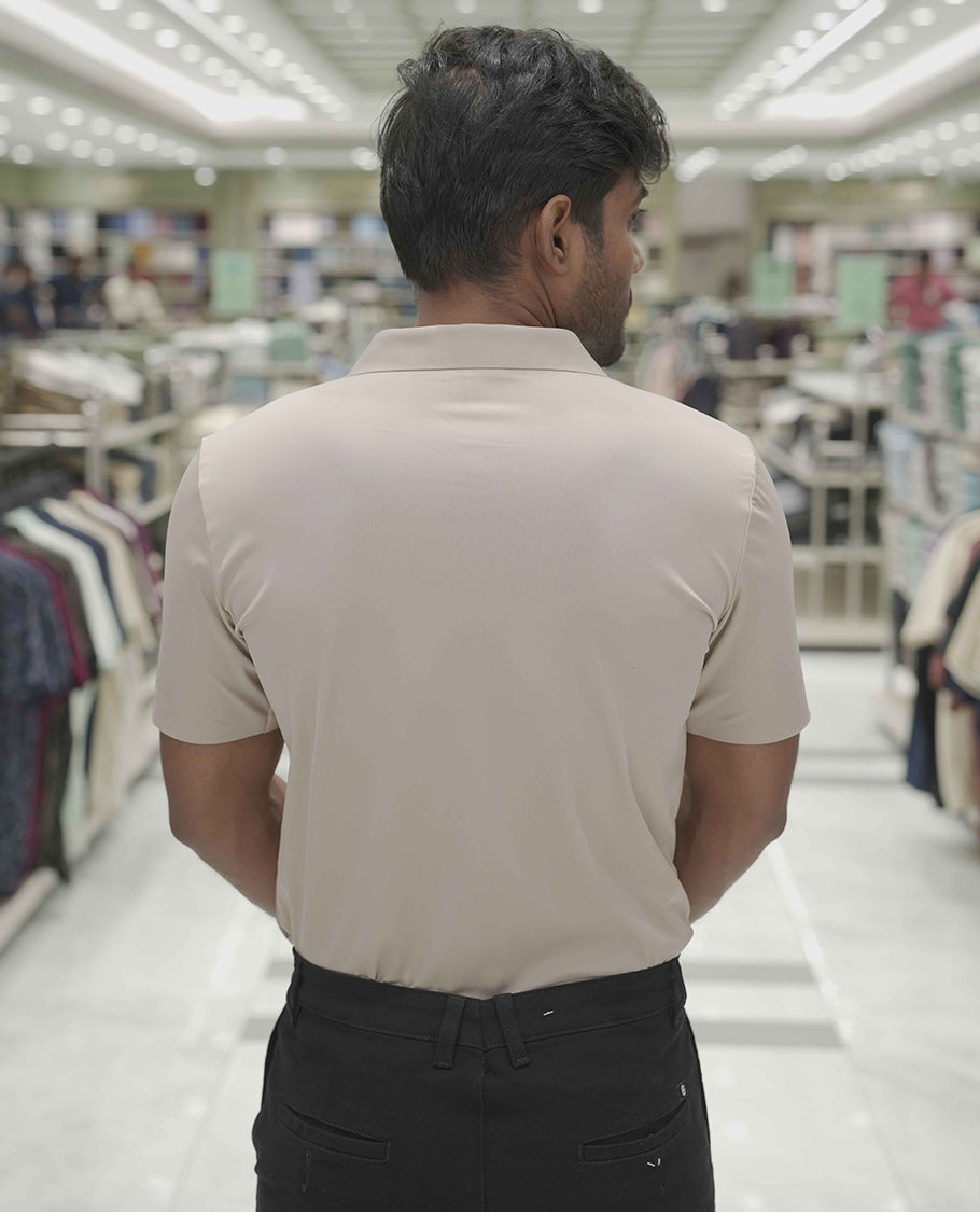 Khaki Plain Poly Lycra Blended Casual Shirt, Comes with a Spread Collar, Stitchless Half-Sleeves, Slim Fit, and Regular Length