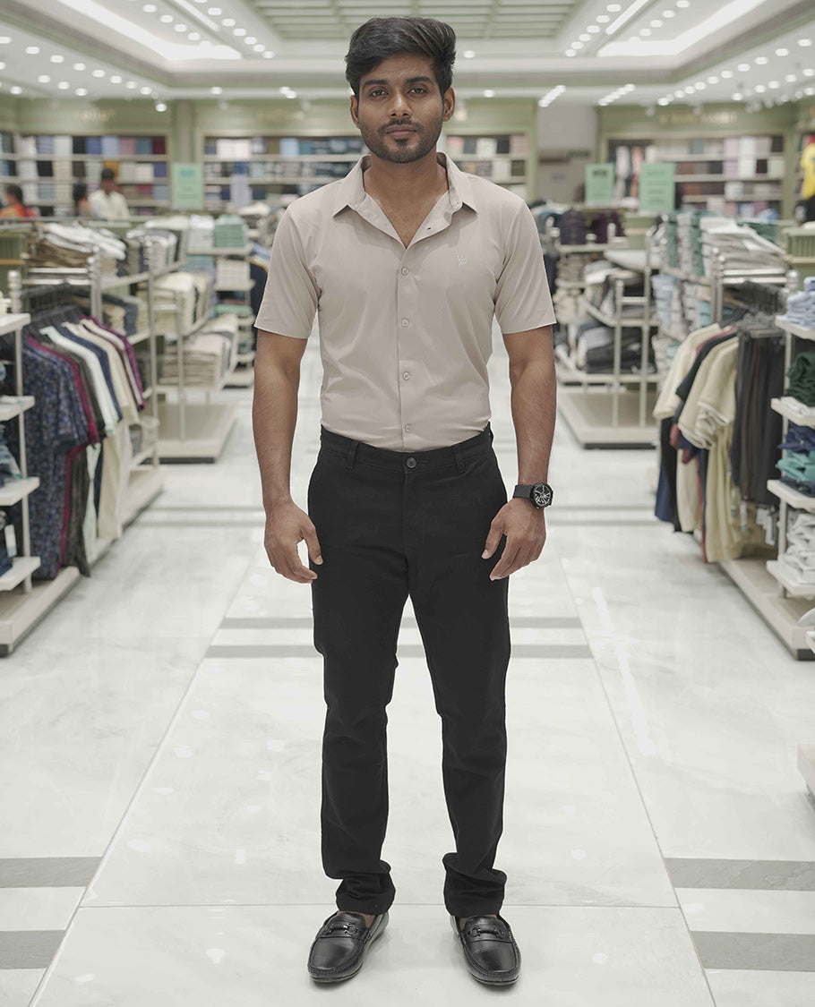 Khaki Plain Poly Lycra Blended Casual Shirt, Comes with a Spread Collar, Stitchless Half-Sleeves, Slim Fit, and Regular Length