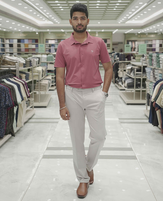 Pink Plain Poly Lycra Blended Casual Shirt, Comes with a Spread Collar, Stitchless Half-Sleeves, Slim Fit, and Regular Length