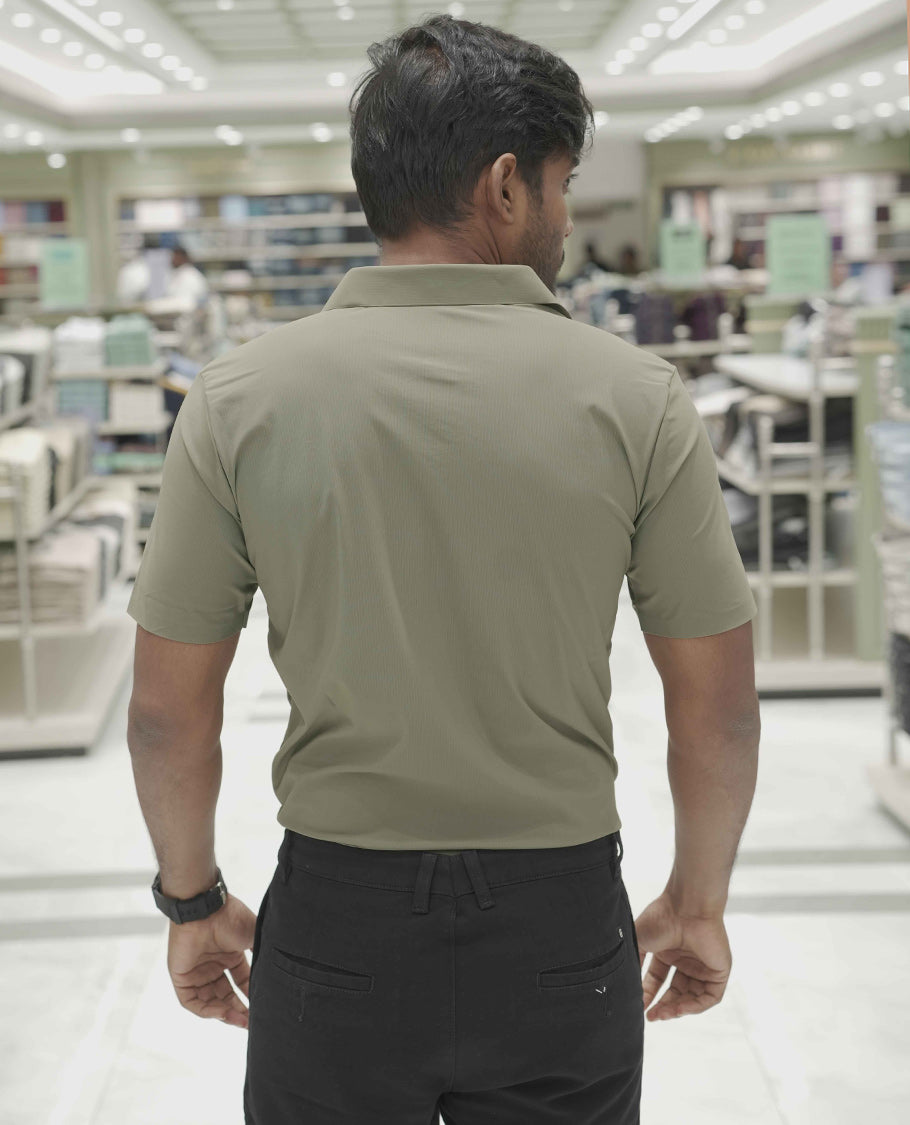 Olive Green Plain Poly Lycra Blended Casual Shirt, Comes with a Spread Collar, Stitchless Half-Sleeves, Slim Fit, and Regular Length