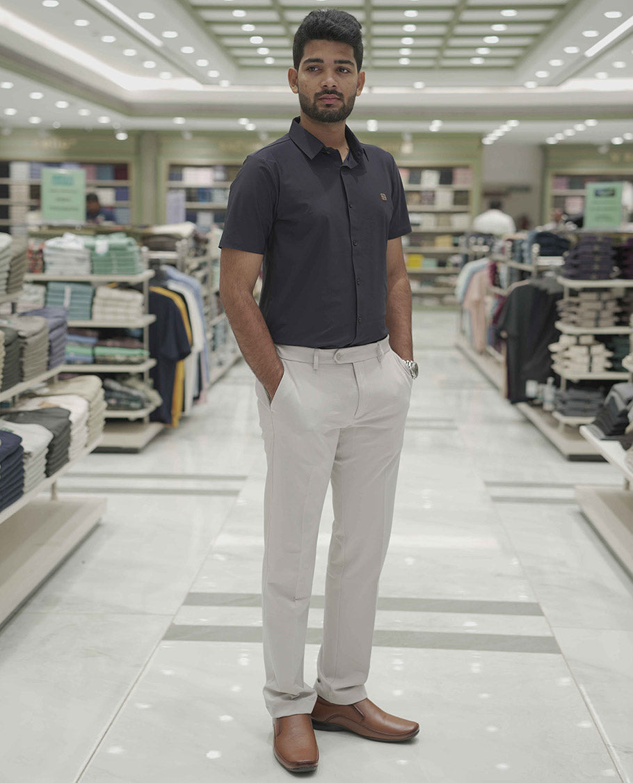 Navy Blue Plain Poly Lycra Blended Casual Shirt, Comes with a Spread Collar, Stitchless Half-Sleeves, Slim Fit, and Regular Length