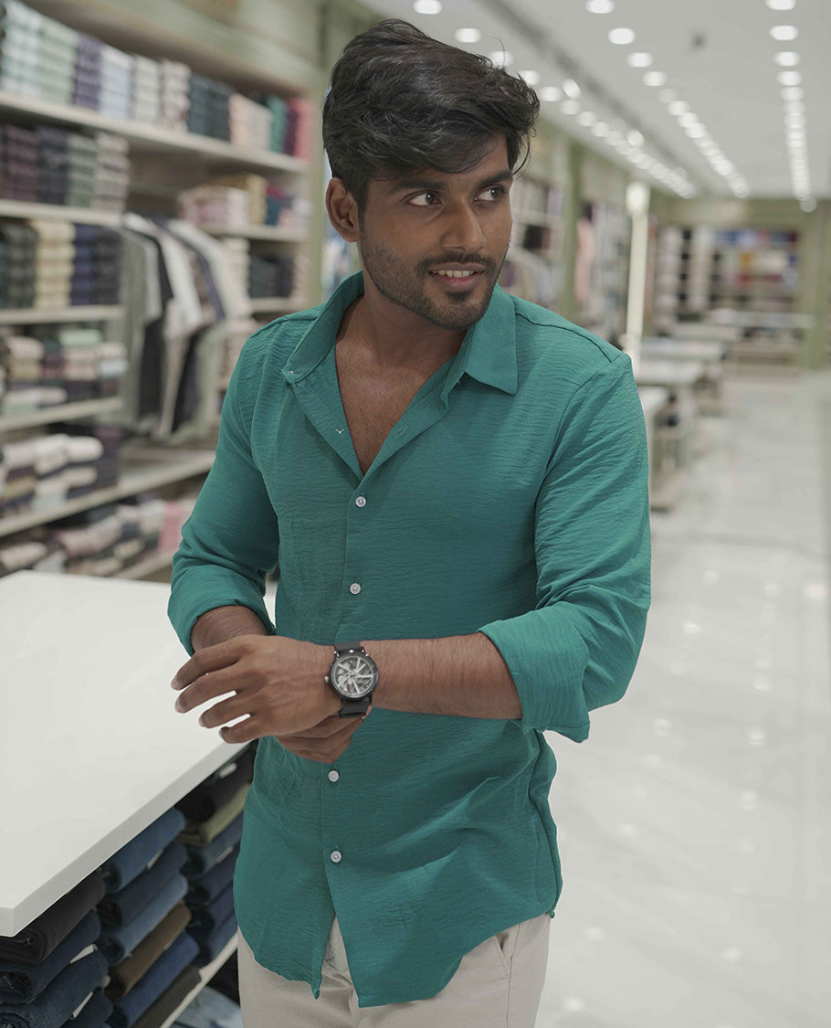 Teal Plain Poly-Blend Casual Shirt, Comes with a Spread Collar, Full-Sleeves, Slim Fit, and Regular Length