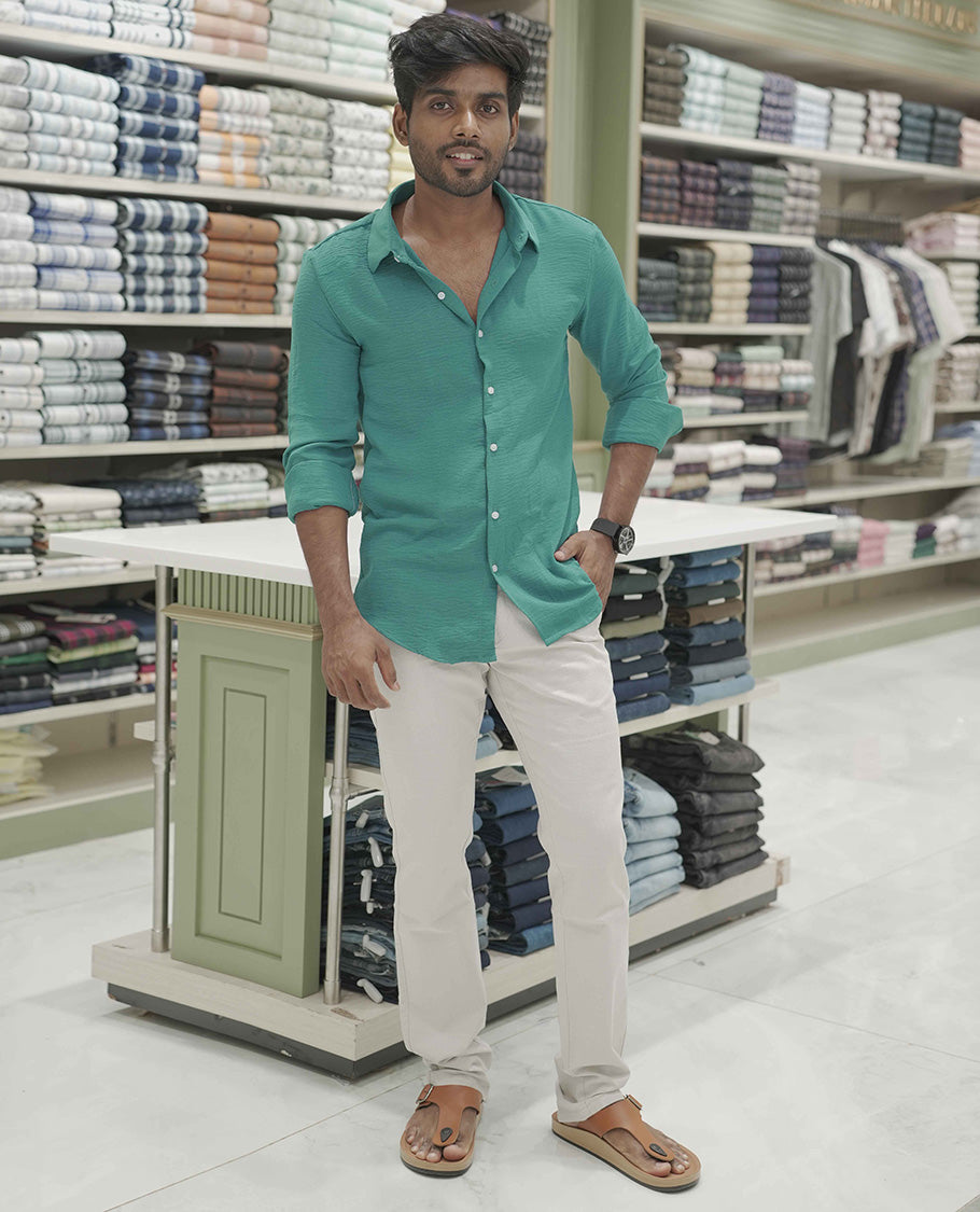 Teal Plain Poly-Blend Casual Shirt, Comes with a Spread Collar, Full-Sleeves, Slim Fit, and Regular Length
